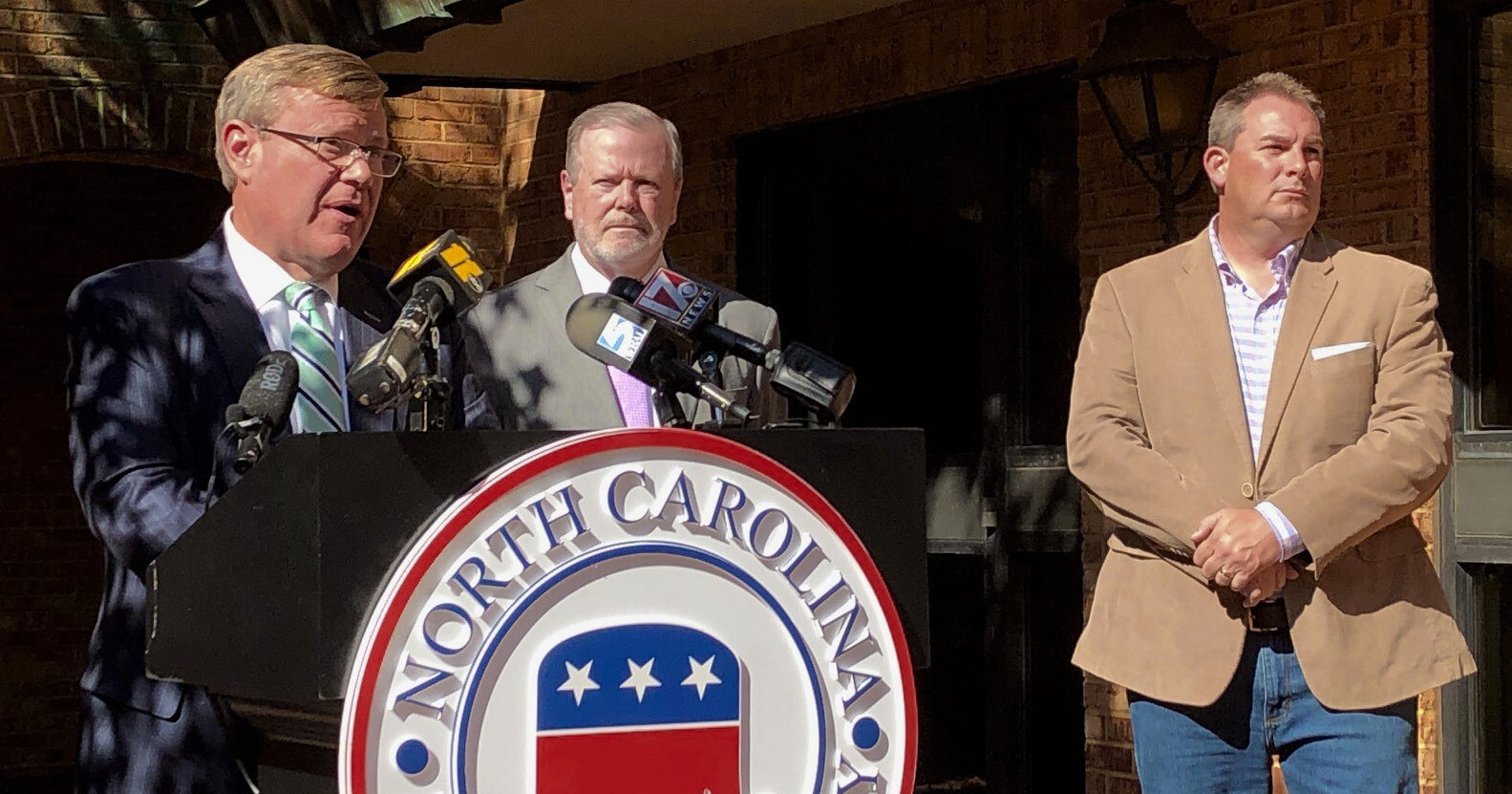 Republican North Carolina House Speaker Tim Moore speaks to reporters with Senate leader Phil Berger, left, and House Majority Leader John Bell, right, at a news conference on Nov. 4, 2020, at state GOP headquarters in Raleigh, North Carolina, to discuss Election Day results.