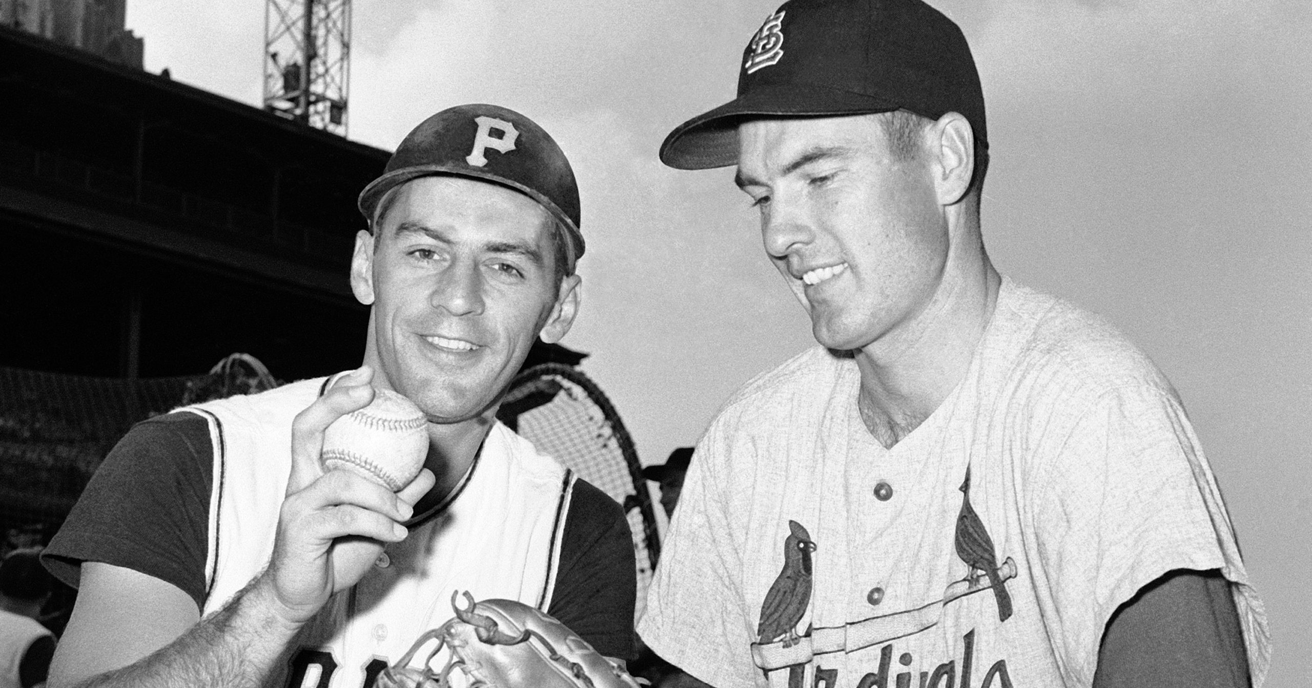 Shortstop Dick Groat, left, of the Pittsburgh Pirates, and pitcher Lindy McDaniel of the St. Louis Cardinals talk at Forbes Field in Pittsburgh on Aug. 11, 1960.