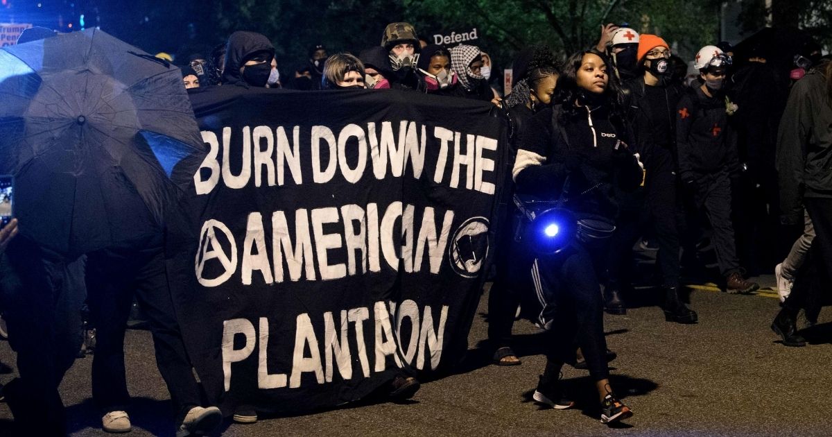 Antifa and Black Lives Matter demonstrators protest on election night near the White House in Washington, D.C., on Nov. 3, 2020.