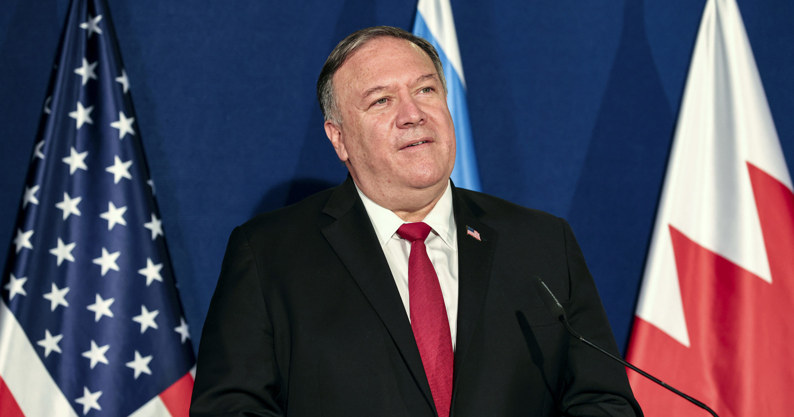 Secretary of State Mike Pompeo looks on during a news conference with the Israeli prime minister and Bahrain's foreign minister after their meeting in Jerusalem on Nov. 18, 2020.