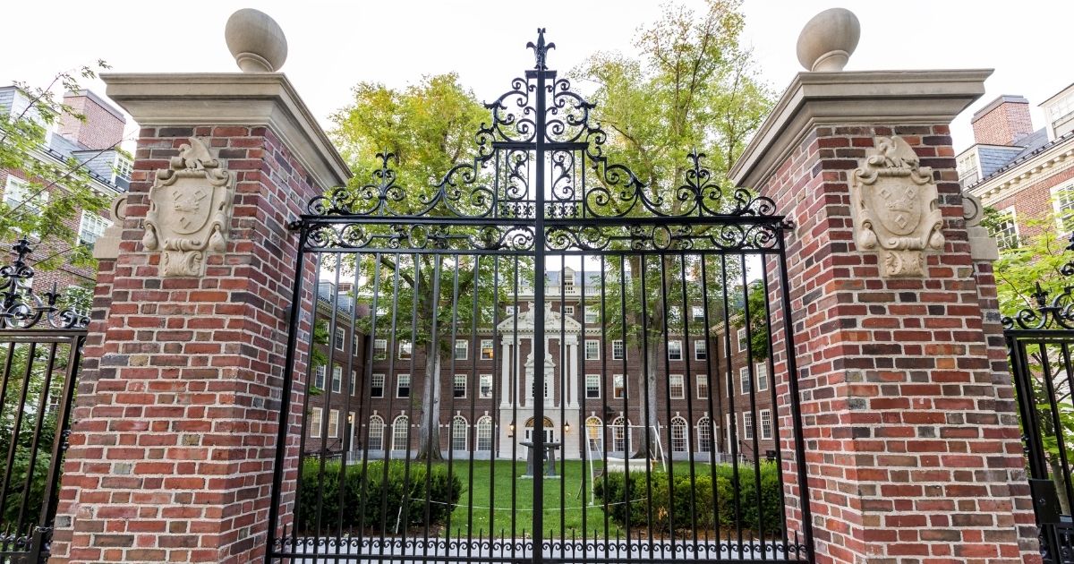 A gate on the campus of Harvard University is seen in this stock image.