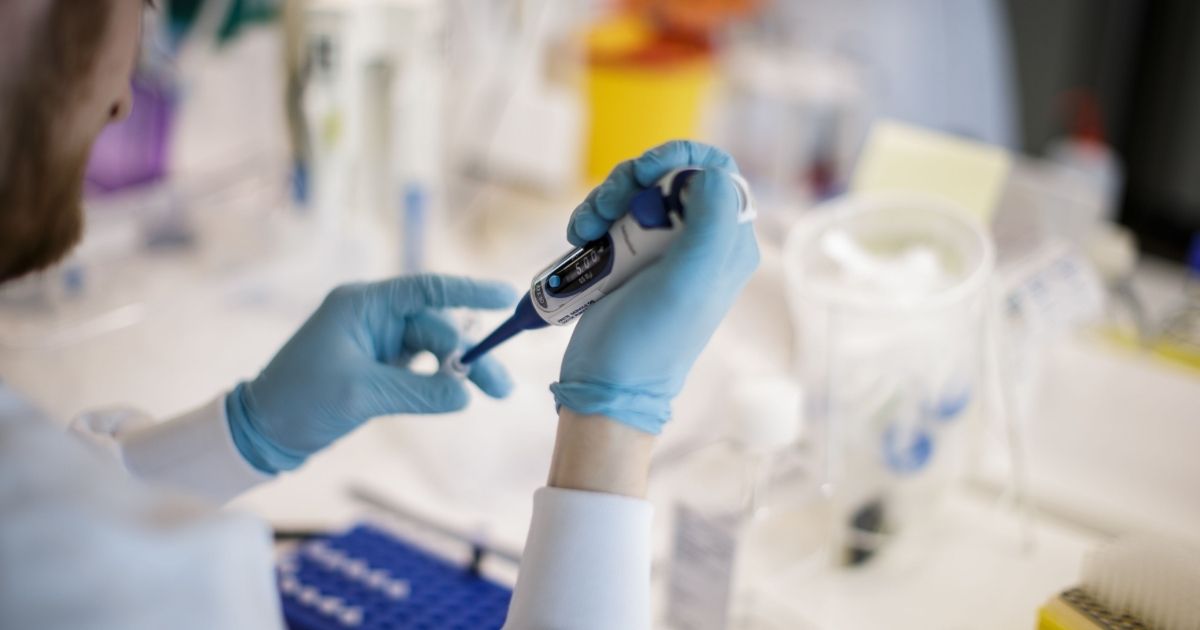 A researcher works on a vaccine against COVID-19 in Copenhagen, Denmark, on March 23, 2020.