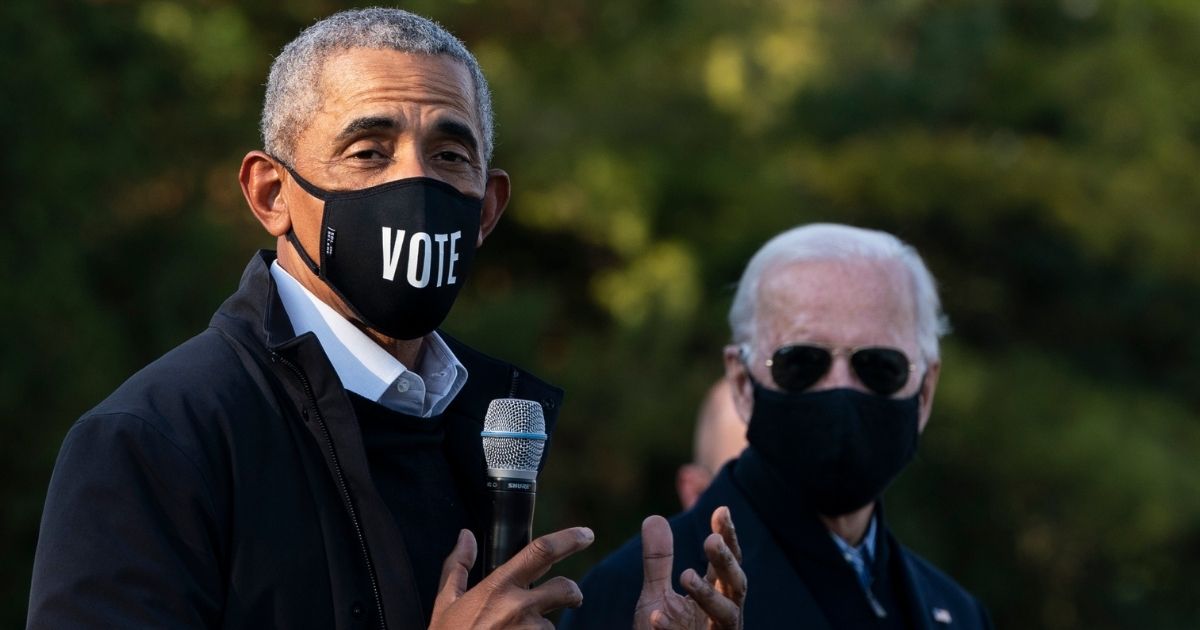 Former President Barack Obama and former Vice President Joe Biden make a stop at a canvass kickoff event at Birmingham Unitarian Church on Oct. 31, 2020, in Bloomfield Hills, Michigan.