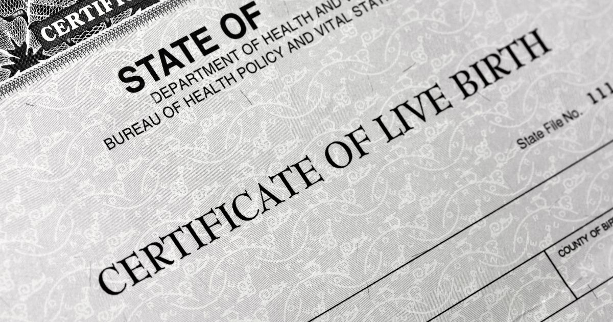 A birth certificate is pictured in the stock image above.