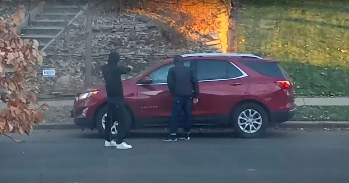 Carjackers confront a woman in her vehicle in Minneapolis.