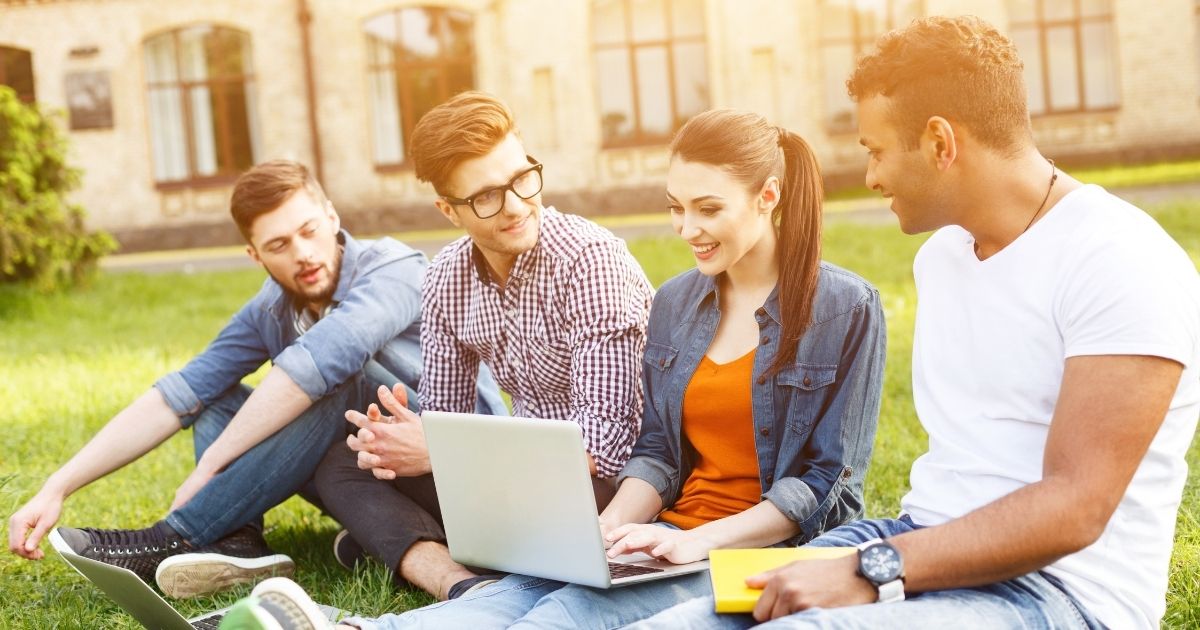A group of college students studying together are pictured in the stock image above.