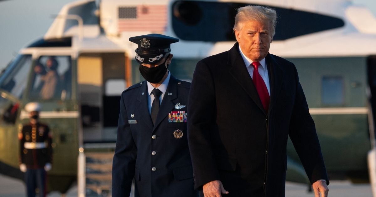 President Donald Trump walks to board Air Force One prior to departure from Joint Base Andrews in Maryland on Tuesday.