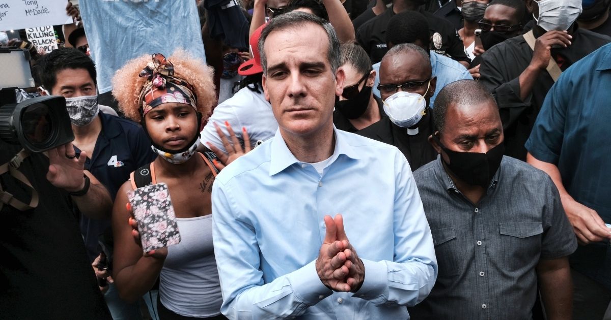 Los Angeles Mayor Eric Garcetti arrives to appeal to Black Lives Matter protesters in downtown Los Angeles on June 2, 2020.