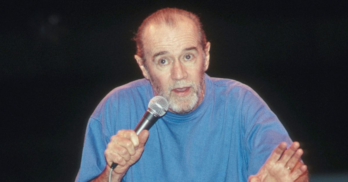 Stand-up comedian George Carlin performs on stage during a live concert appearance on July 8, 1989.