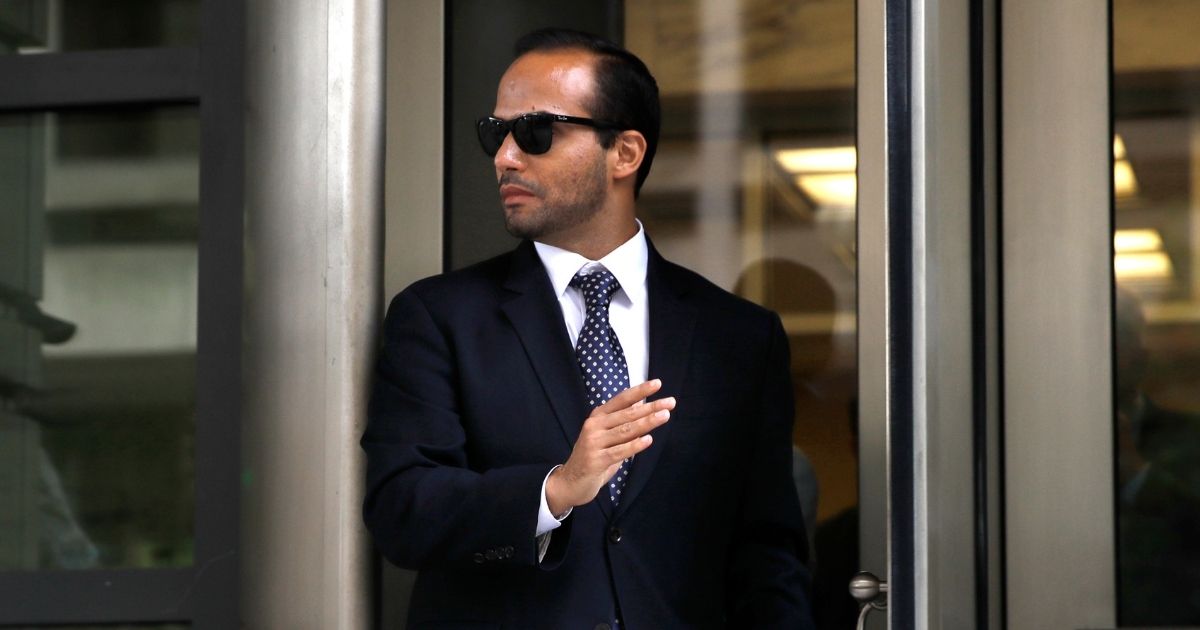 In this Friday, Sept. 7, 2018, file photo, former Donald Trump presidential campaign foreign policy adviser George Papadopoulos leaves federal court after he was sentenced to 14 days in prison, in Washington.