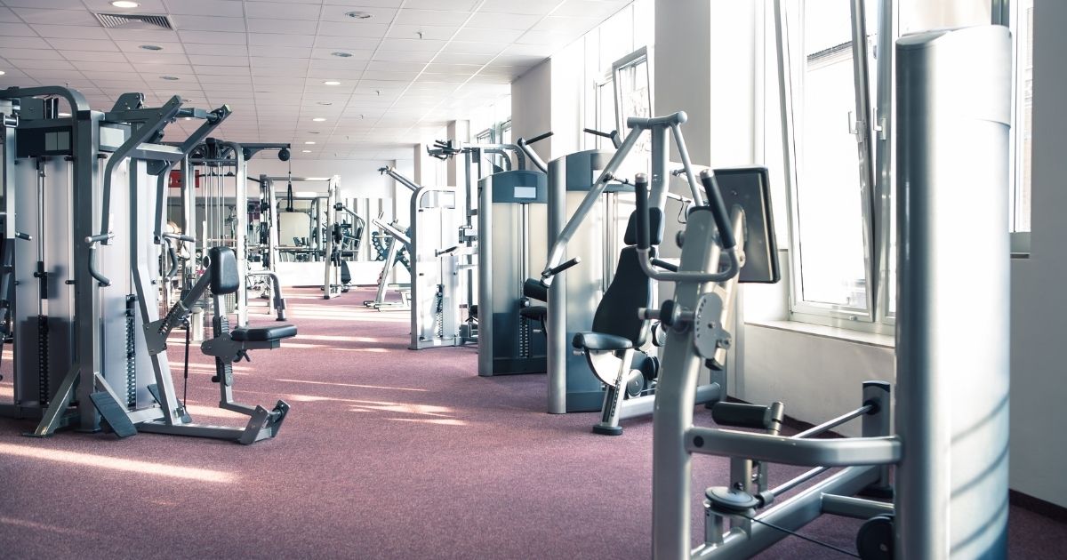 The above stock photo shows the interior of a gym.