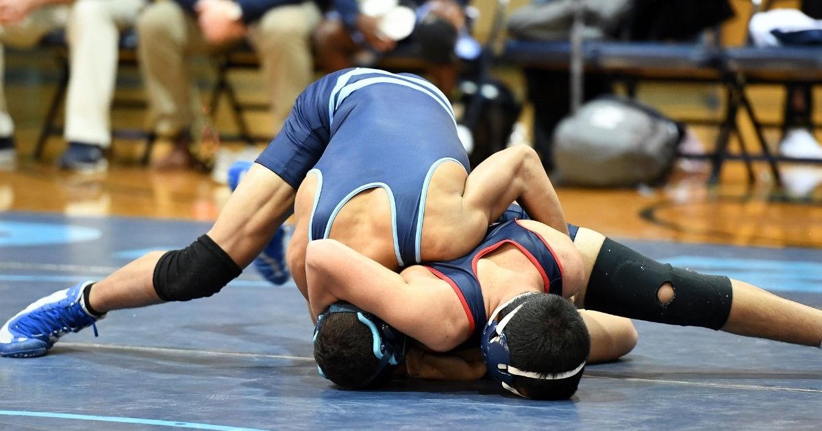 In addition to the ban on athletes' handshakes, the new Ohio rules also order officials not to "declare the winner of the match by raising the winning wrestler’s hand."