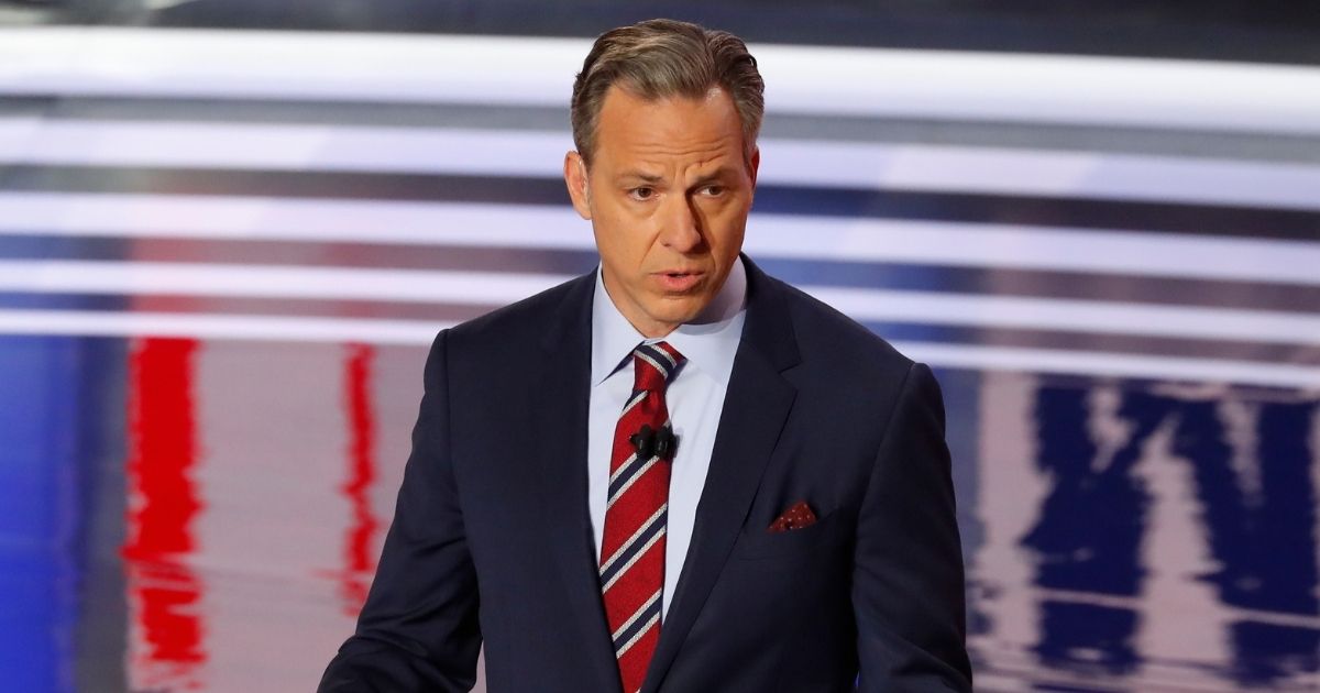 Jake Tapper speaks before the first of two Democratic presidential primary debates hosted by CNN on July 30, 2019, at the Fox Theatre in Detroit.