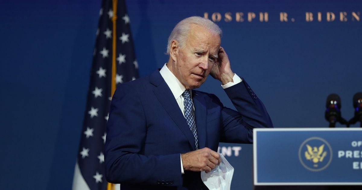 Presumptive President-elect Joe Biden arrives to address the media after receiving a briefing from the transition COVID-19 advisory board on November 09 at the Queen Theater in Wilmington, Delaware.
