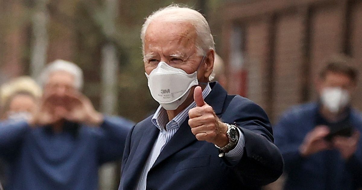 Presumptive president-elect Joe Biden gives a thumbs-up as he leaves Pennsylvania Hospital after a follow up appointment at the radiology department Dec. 12 in Philadelphia.