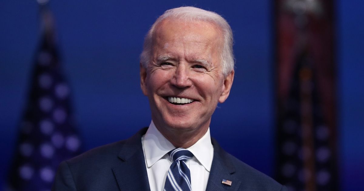 Presumptive President-elect Joe Biden smiles during a media briefing Nov. 10 at the Queen Theater in Wilmington, Delaware.