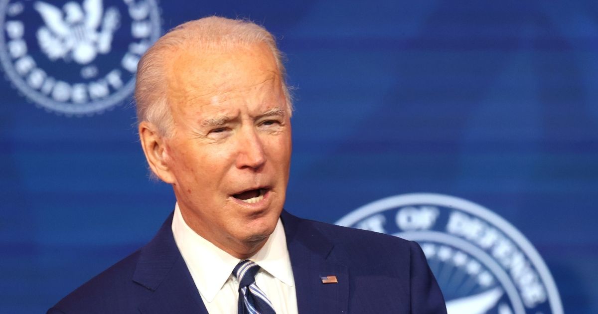 Presumptive president-elect Joe Biden speaks at the Queen Theatre on Tuesday in Wilmington, Delaware.