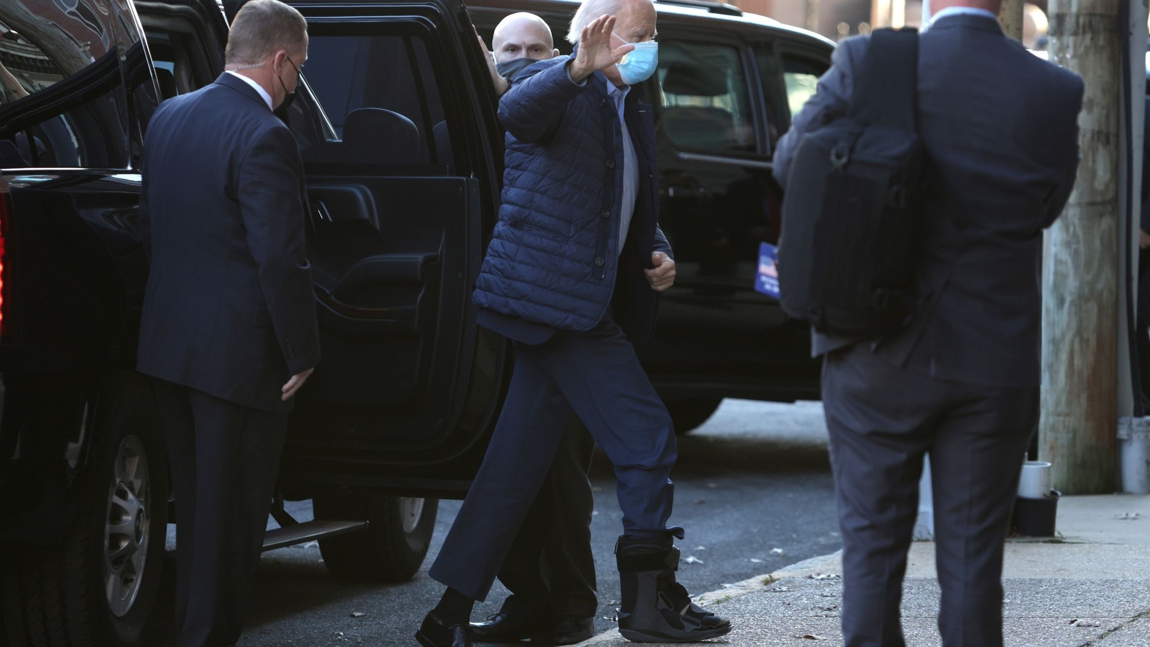 U.S. presumptive President-elect Joe Biden waves as he arrives for a virtual roundtable with workers and small business owners at The Queen Theatre on December 2, 2020, in Wilmington, Delaware.