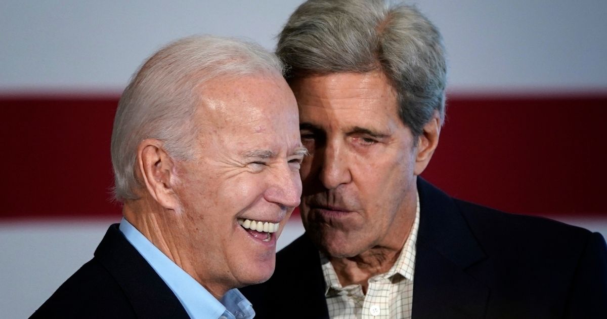 Former Vice president Joe Biden, left, campaigns with former Democratic presidential candidate John Kerry on Dec. 6, 2019, in Cedar Rapids, Iowa.