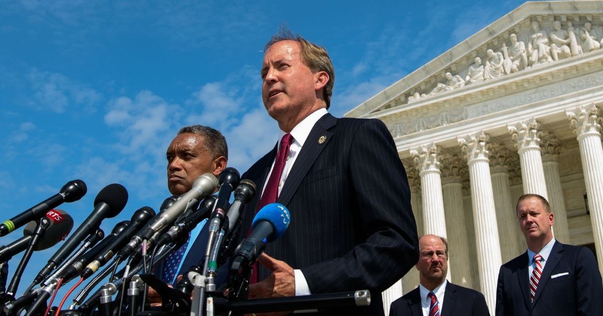District of Columbia Attorney General Karl Racine, left, and Texas Attorney General Ken Paxton speak during the launch of an antitrust investigation into large tech companies outside of the U.S. Supreme Court in Washington, D.C., on Sept. 9, 2019.