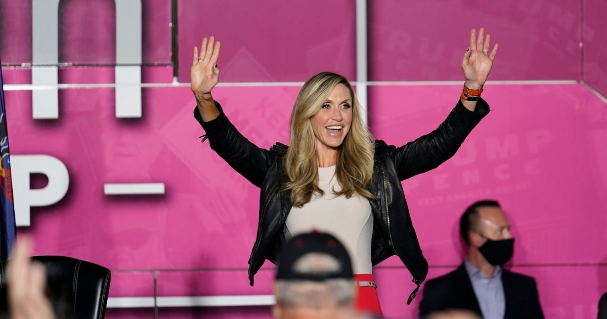 Lara Trump waves as she arrives on a Women for Trump Bus Tour campaign event on Oct. 8, 2020, in New Castle, Pennsylvania.