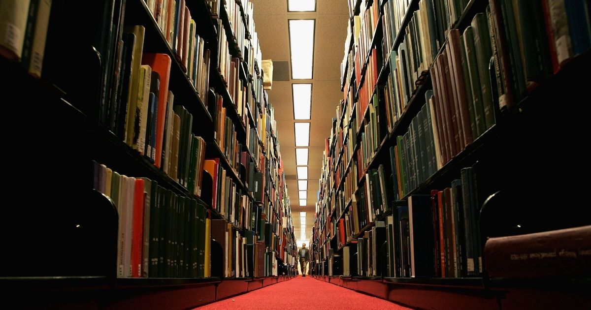 A man browses through books at the Cecil H. Green Library on the Stanford University Campus on Dec. 17, 2004, in Stanford, California.