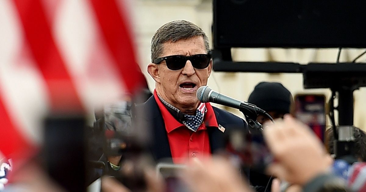 Former National Security Advisor Michael Flynn speaks to supporters of President Donald Trump during the Million MAGA March to protest the likely outcome of the 2020 presidential election in front of the U.S. Supreme Court on Saturday in Washington, D.C.