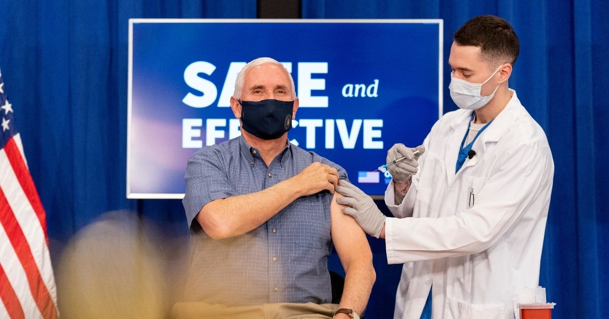 Vice President Mike Pence receives a Pfizer-BioNTech COVID-19 vaccine shot at the Eisenhower Executive Office Building on the White House complex in Washington on Friday.