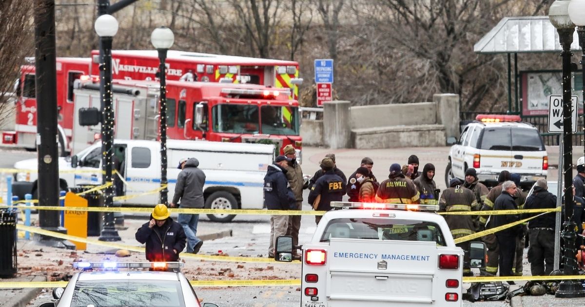FBI agents and first responders work on the scene after an explosion in Nashville, Tennessee, on Friday.