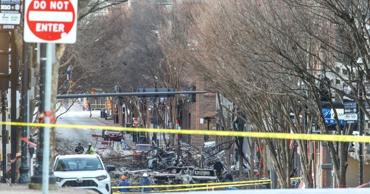 Police close off an area damaged by an explosion on Christmas morning in Nashville, Tennessee, on Friday.