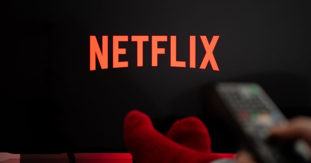 Netflix is featured on a TV in the above stock image.