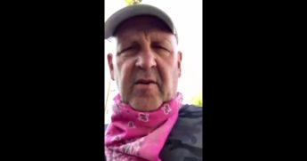 Actor Nick Searcy walks down a street in Los Angeles in defiance of the city's lockdown order.