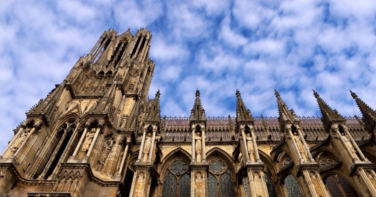 The south tower of Notre-Dame de Reims, a Roman Catholic cathedral built in the French Gothic architectural style and dedicated to the Virgin Mary, on October 5, 2019 in Reims, the largest city of the Champagne production region of eastern France.