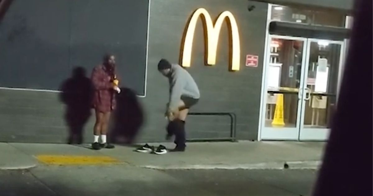 A man removes his own sweatpants to give to a homeless man who only had shorts to wear in 40-degree weather.