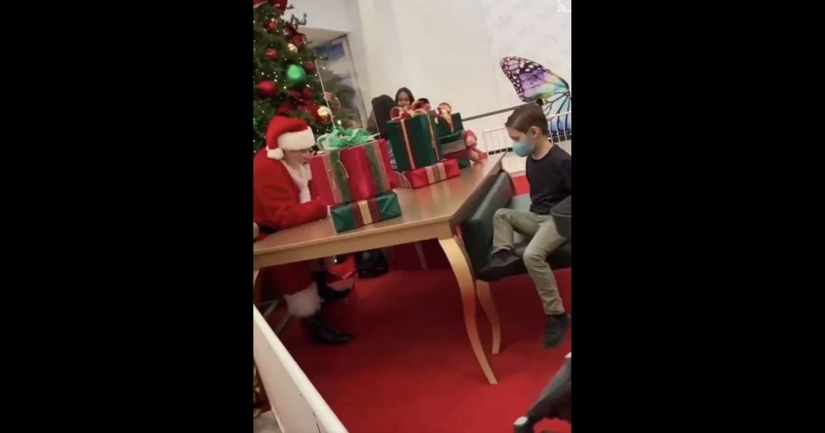 A man portraying Santa is going viral online after he allegedly refused to affirm to a small boy that he would stick a toy NERF gun under his Christmas tree on Dec. 24.