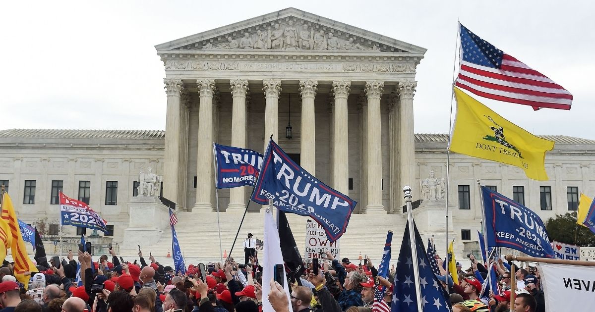 Supporters of President Donald Trump participate in the Million MAGA March to protest the likely outcome of the 2020 presidential election in front of the Supreme Court in Washington, D.C., on Saturday.
