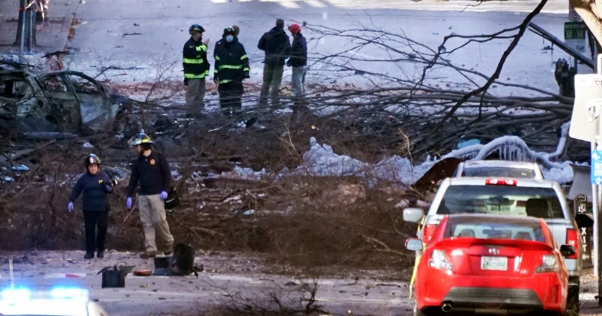 Investigators work on Saturday at the scene of the Christmas Day explosion in Nashville, Tennessee.