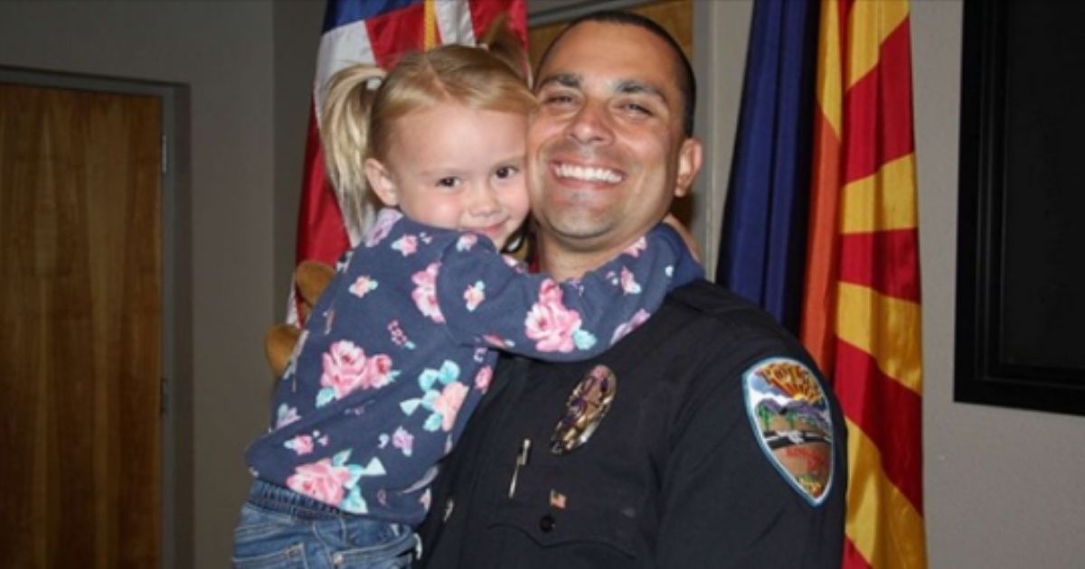 Lieutenant Brian Zach with Kaila, a girl he met during a case in 2018 and ended up adopting in 2020. (Good Morning America