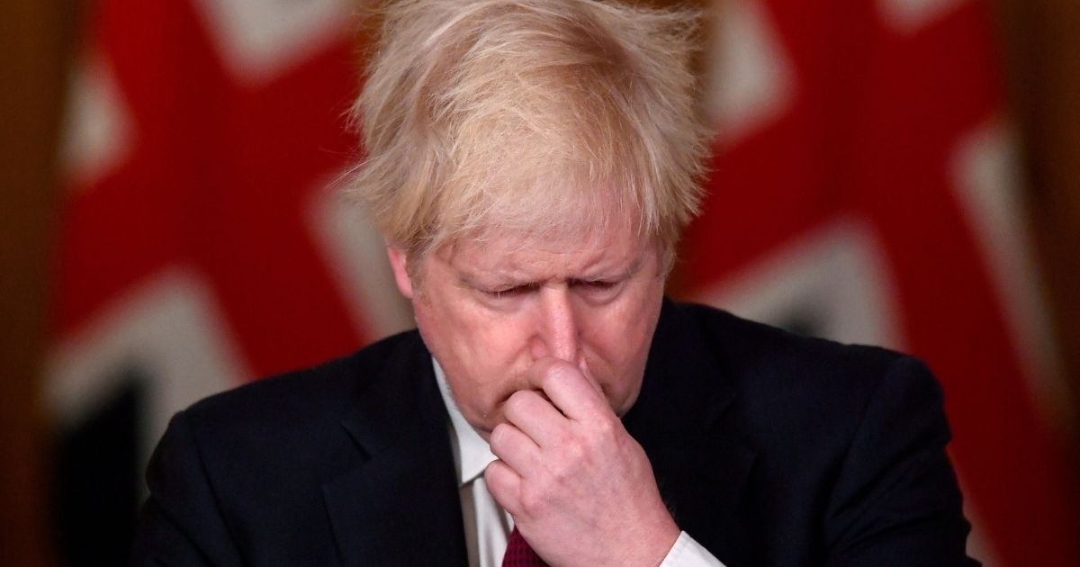 British Prime Minister Boris Johnson speaks during a news conference inside 10 Downing Street on Dec. 19, 2020, in London.