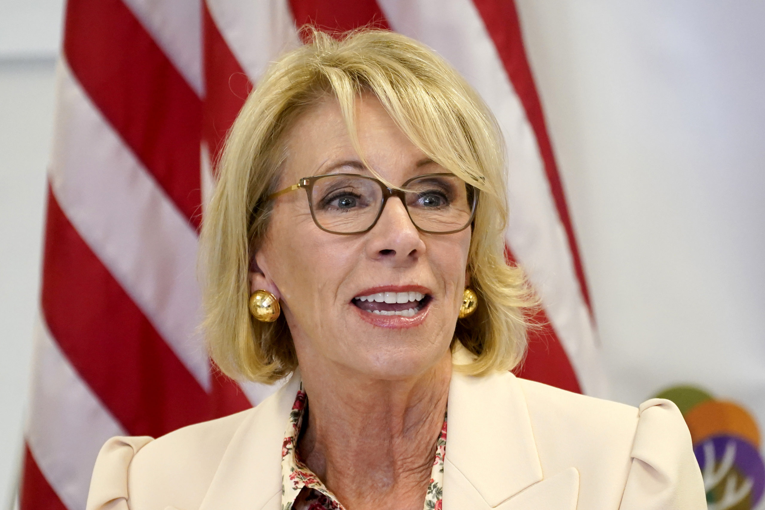 In this Oct. 15, 2020, file photo, Secretary of Education Betsy DeVos speaks at the Phoenix International Academy in Phoenix.