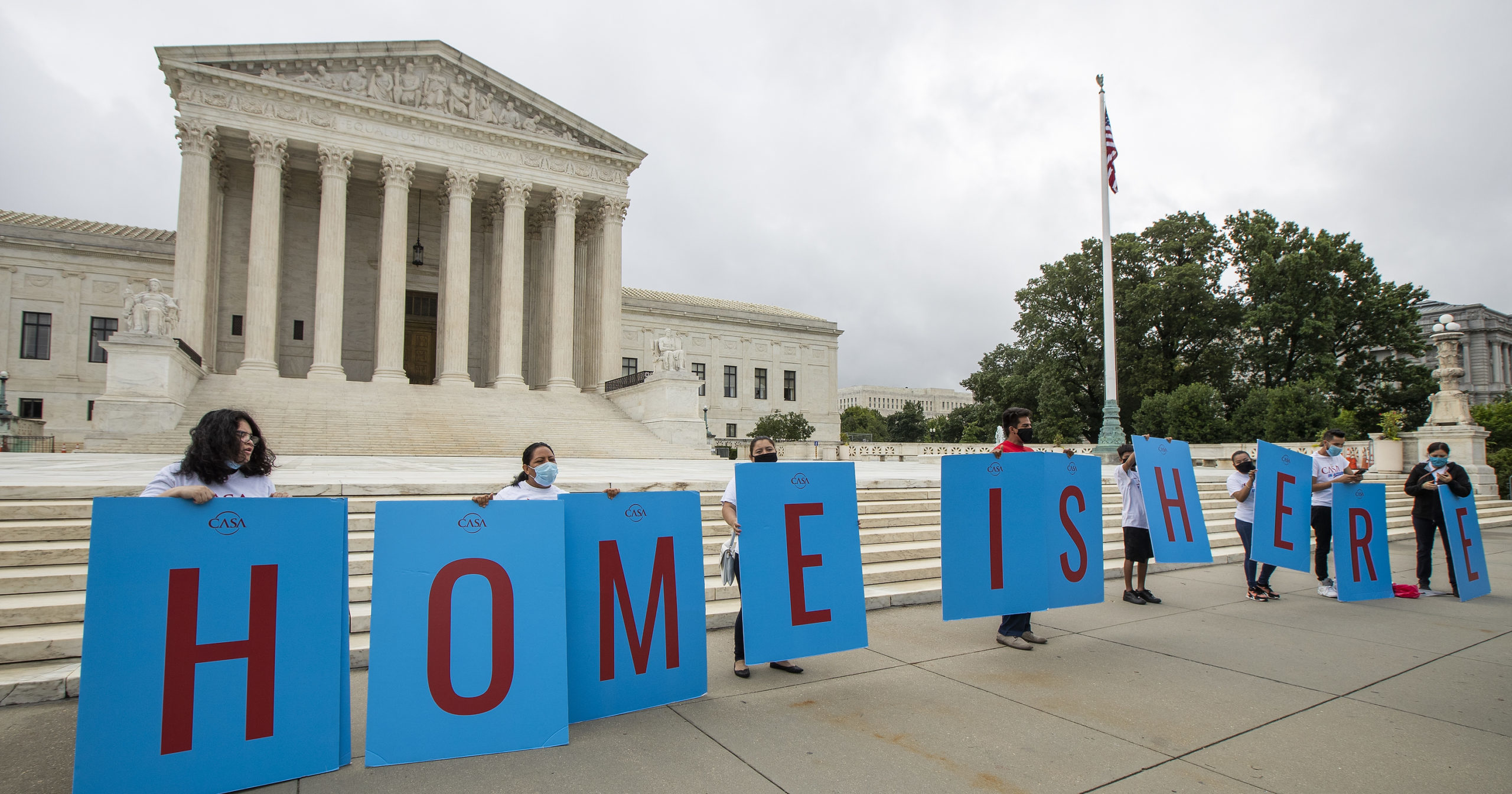 In this June 18, 2020, file photo, students protected from deportation by the Deferred Action for Childhood Arrivals program gather in front of the Supreme Court in Washington, D.C.