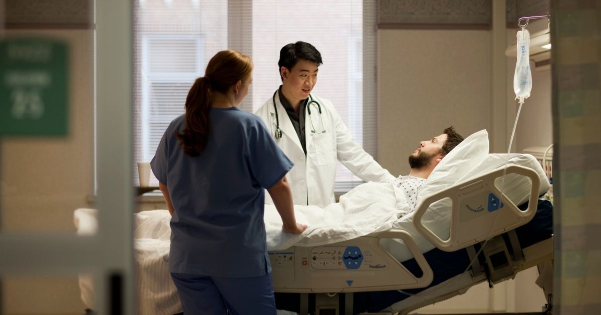 A doctor speaks to a patient in this stock image.