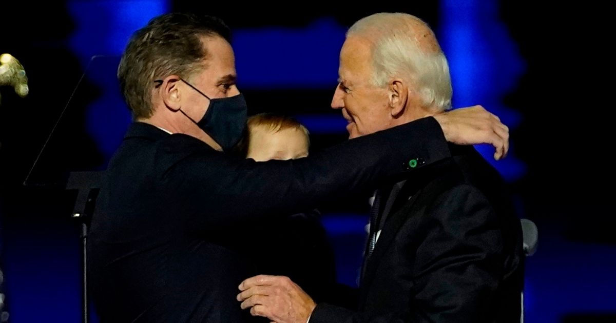 Joe Biden embraces his son Hunter Biden after addressing the nation on Nov. 7, 2020, in Wilmington, Delaware.