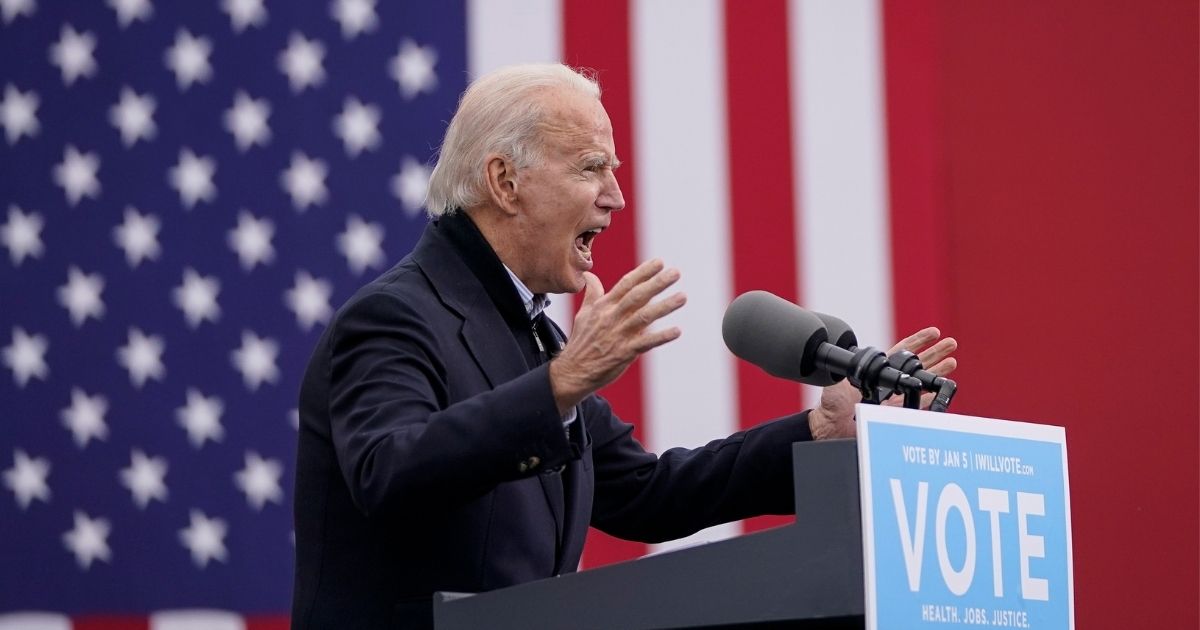 Joe Biden speaks during a rally for US Senate candidates Jon Ossoff and Raphael Warnock at Pullman Yard on Dec. 15, 2020, in Atlanta, Georgia.