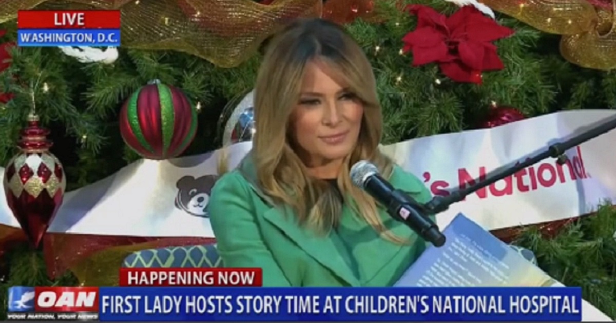 First lady Melania Trump reads aloud during a Christmas event Tuesday at Children's National Hospital in Washington.