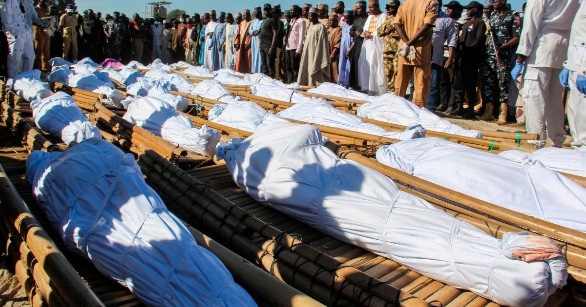 Mourners attend the funeral of 43 farm workers in Zabarmari, Nigeria, on Nov. 29, 2020, after they were killed by Boko Haram fighters in rice fields on Nov. 28, 2020.