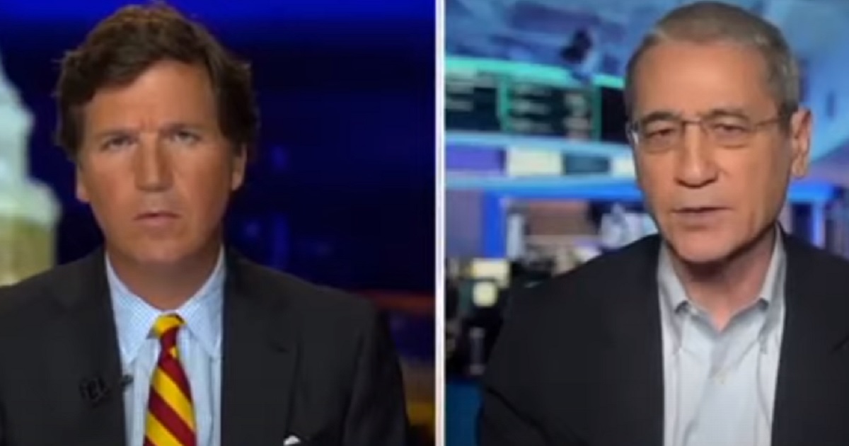 Fox News host Tucker Carlson interviews China specialist Gordon Chang Monday.