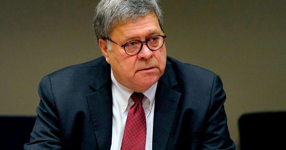 Attorney General William Barr meets with members of the St. Louis Police Department on Oct. 15, 2020, in St. Louis, Missouri.