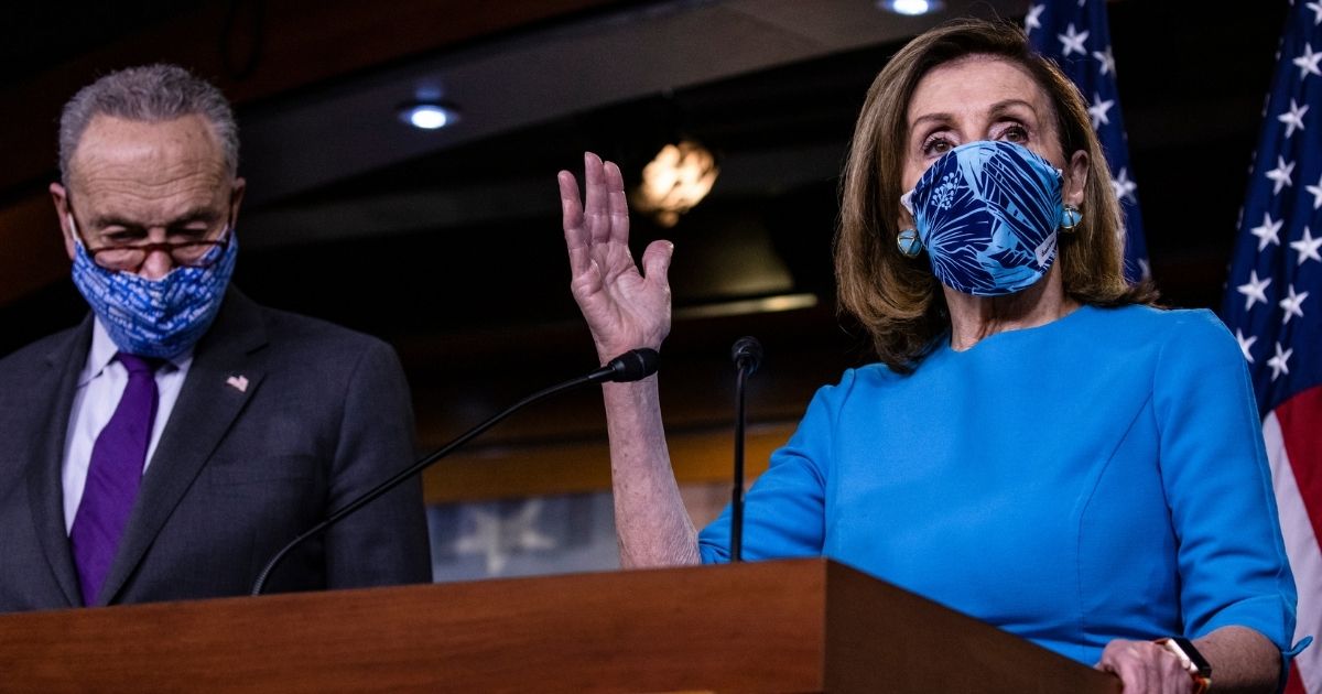 Speaker of the House Nancy Pelosi and Senate Minority Leader Chuck Schumer hold a news conference on Capitol Hill in Washington, D.C., on Nov. 6, 2020.
