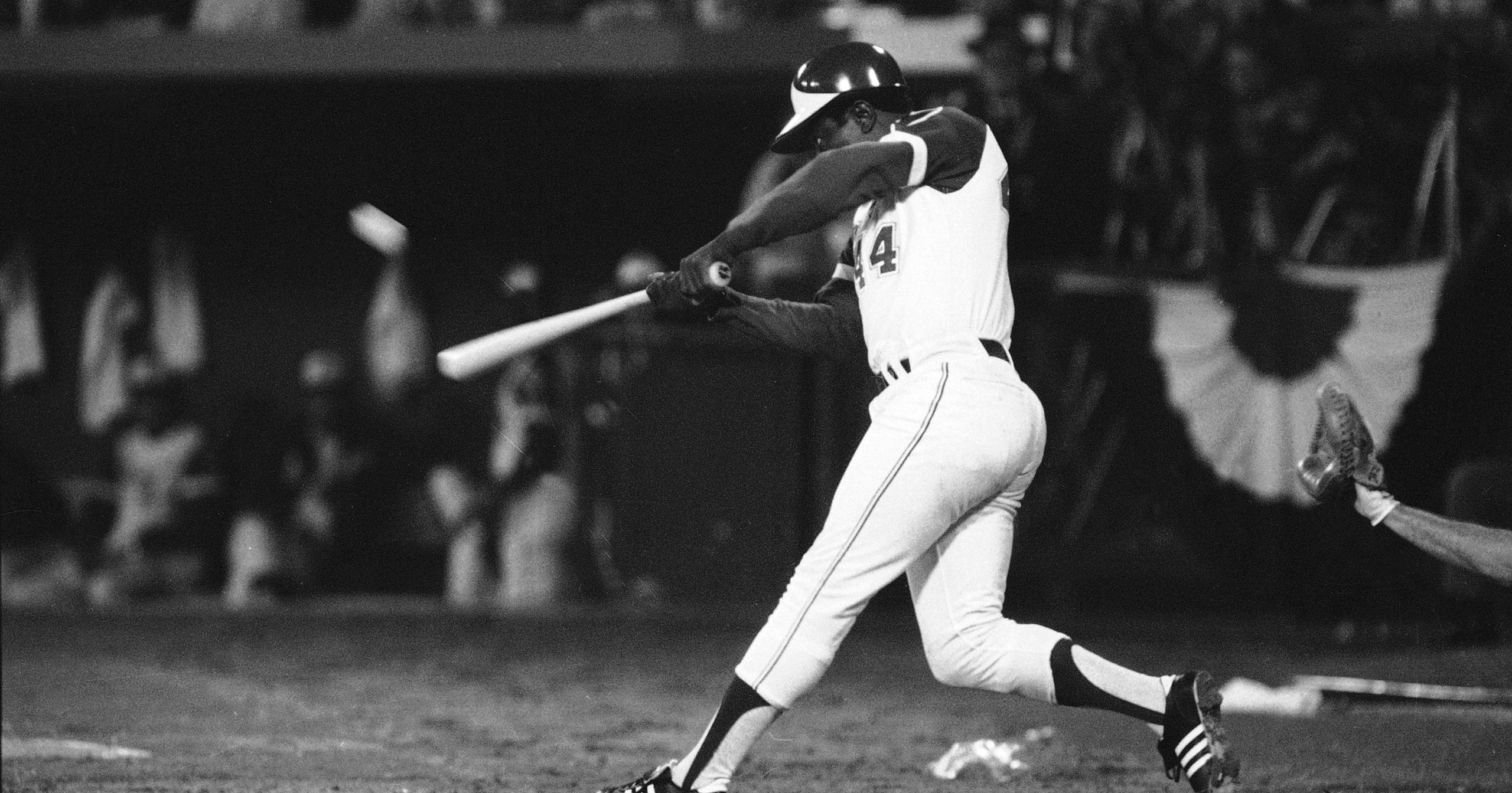 Hank Aaron hits his 715th career home run in Atlanta Stadium to break the all-time record on April 8, 1974.